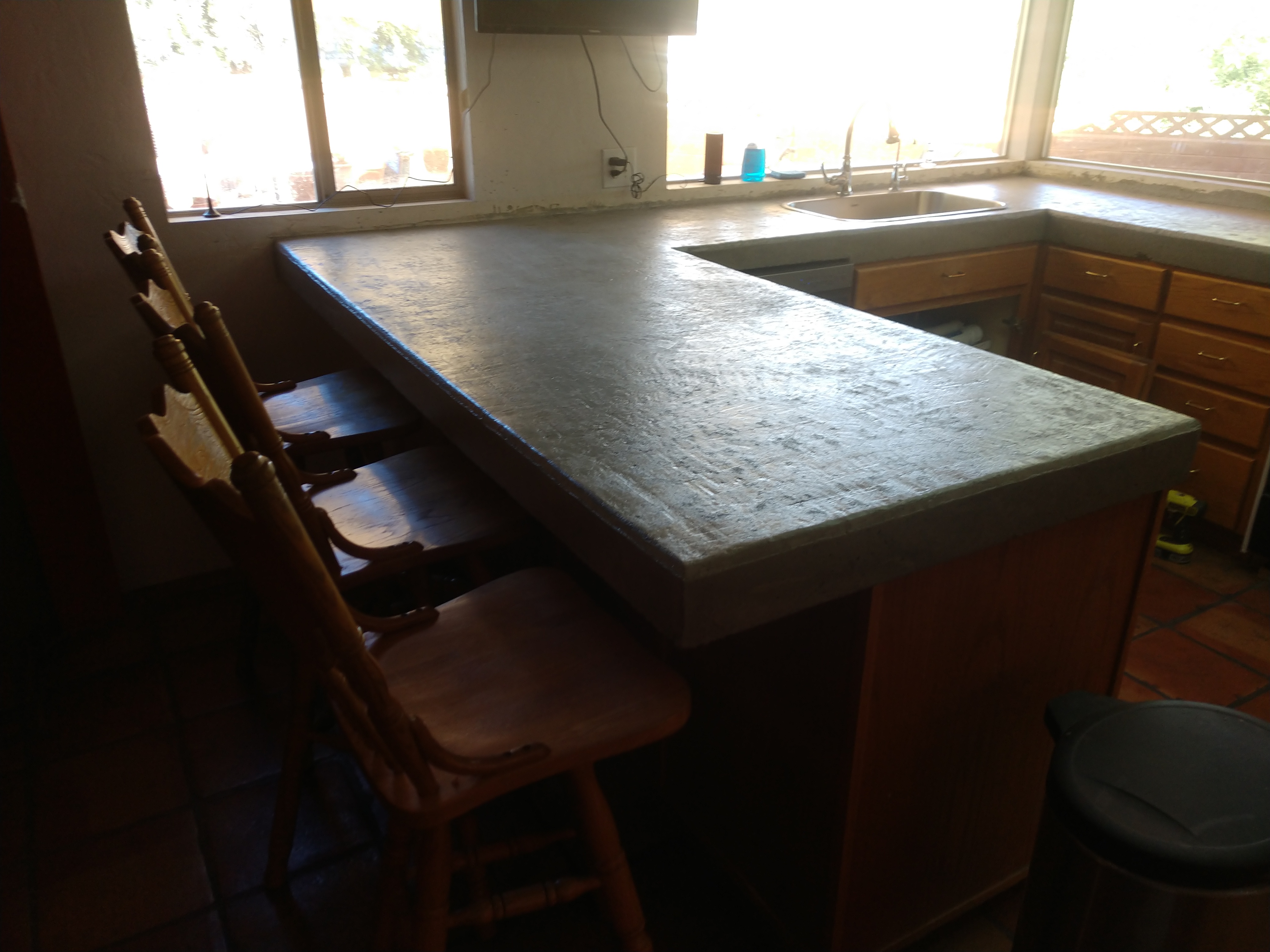 Finished concrete countertop in modern kitchen