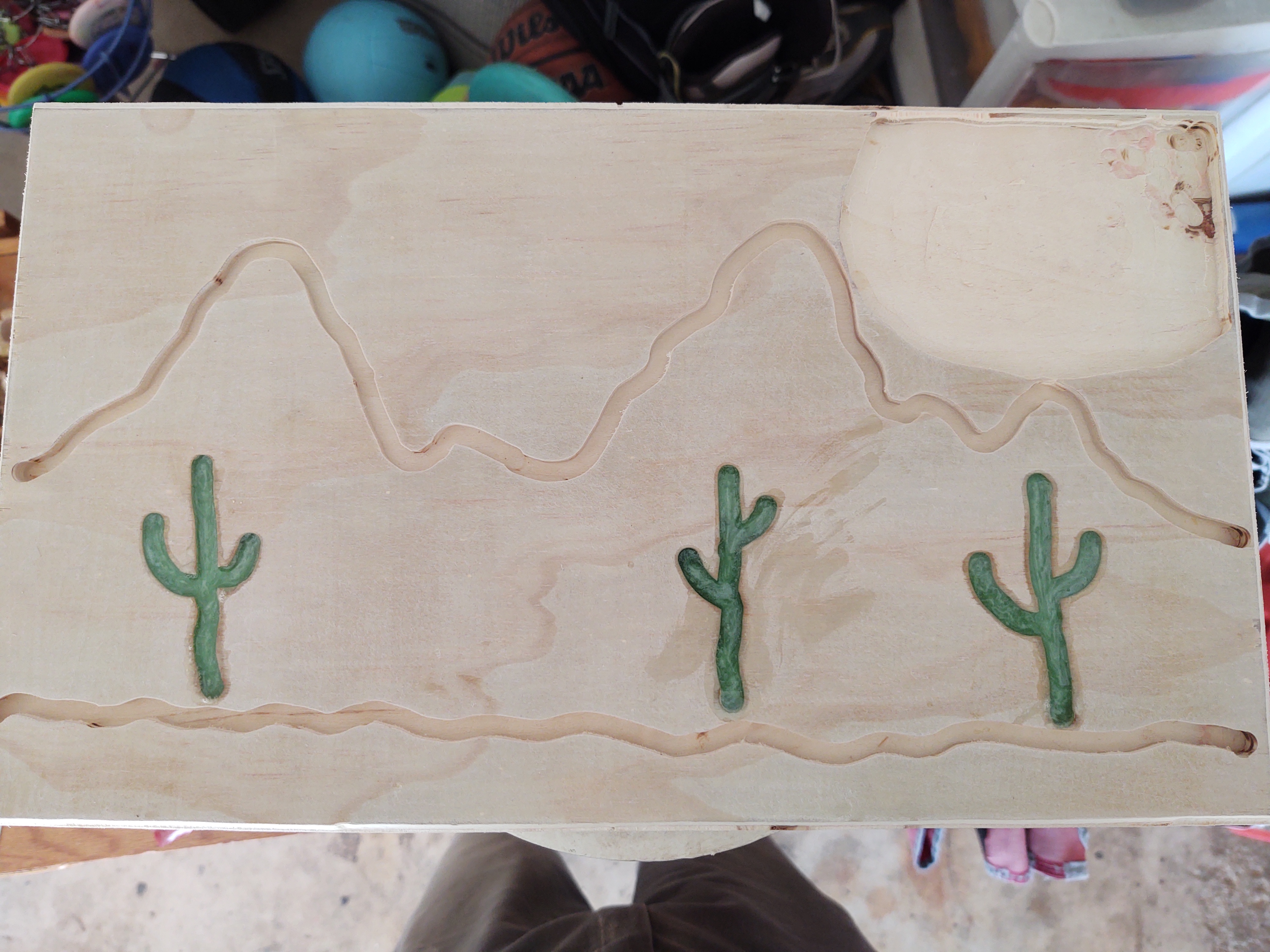 Relief-carved desert landscape with sunset