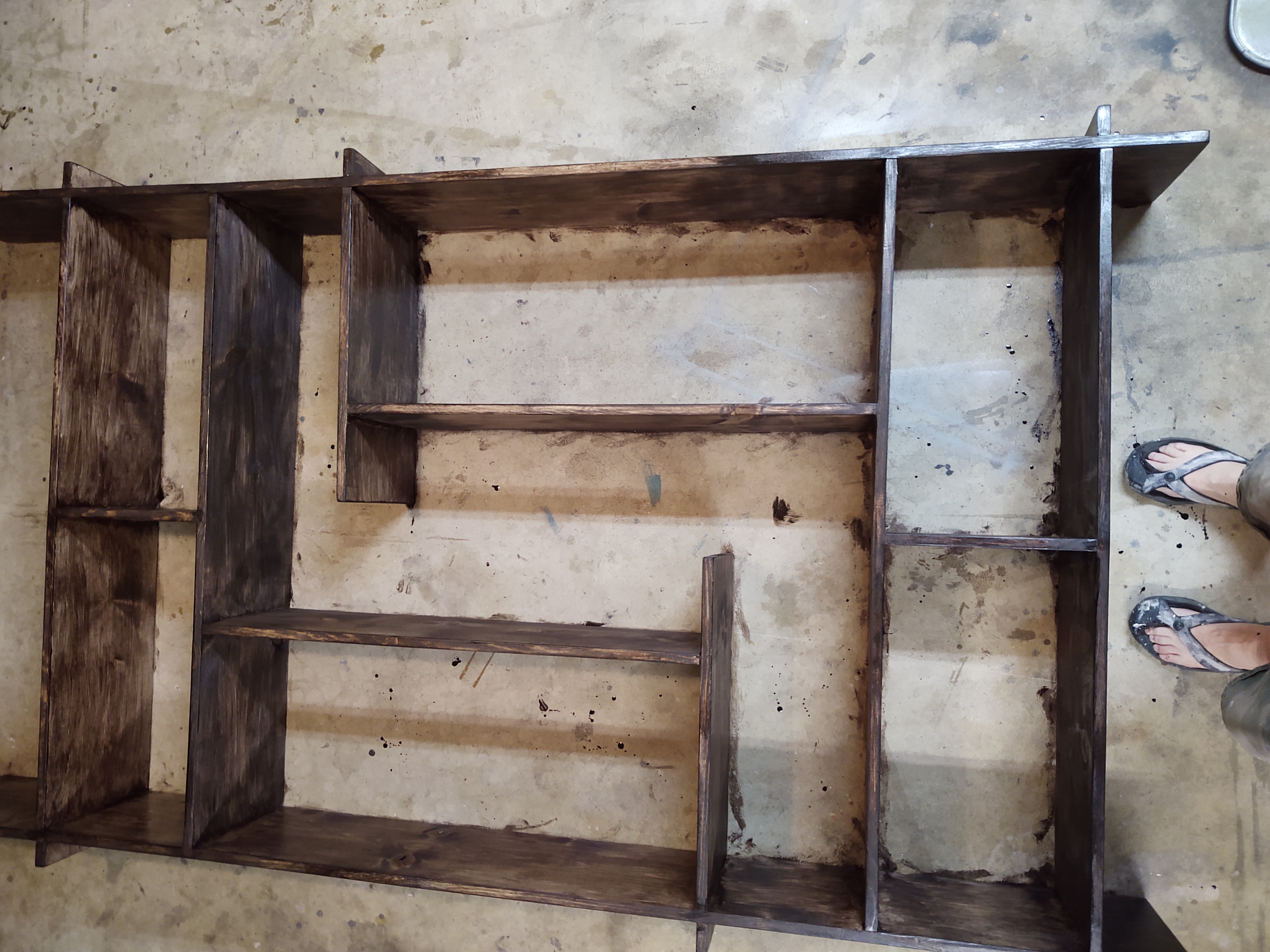 Stained modular shelving unit - compartment detail